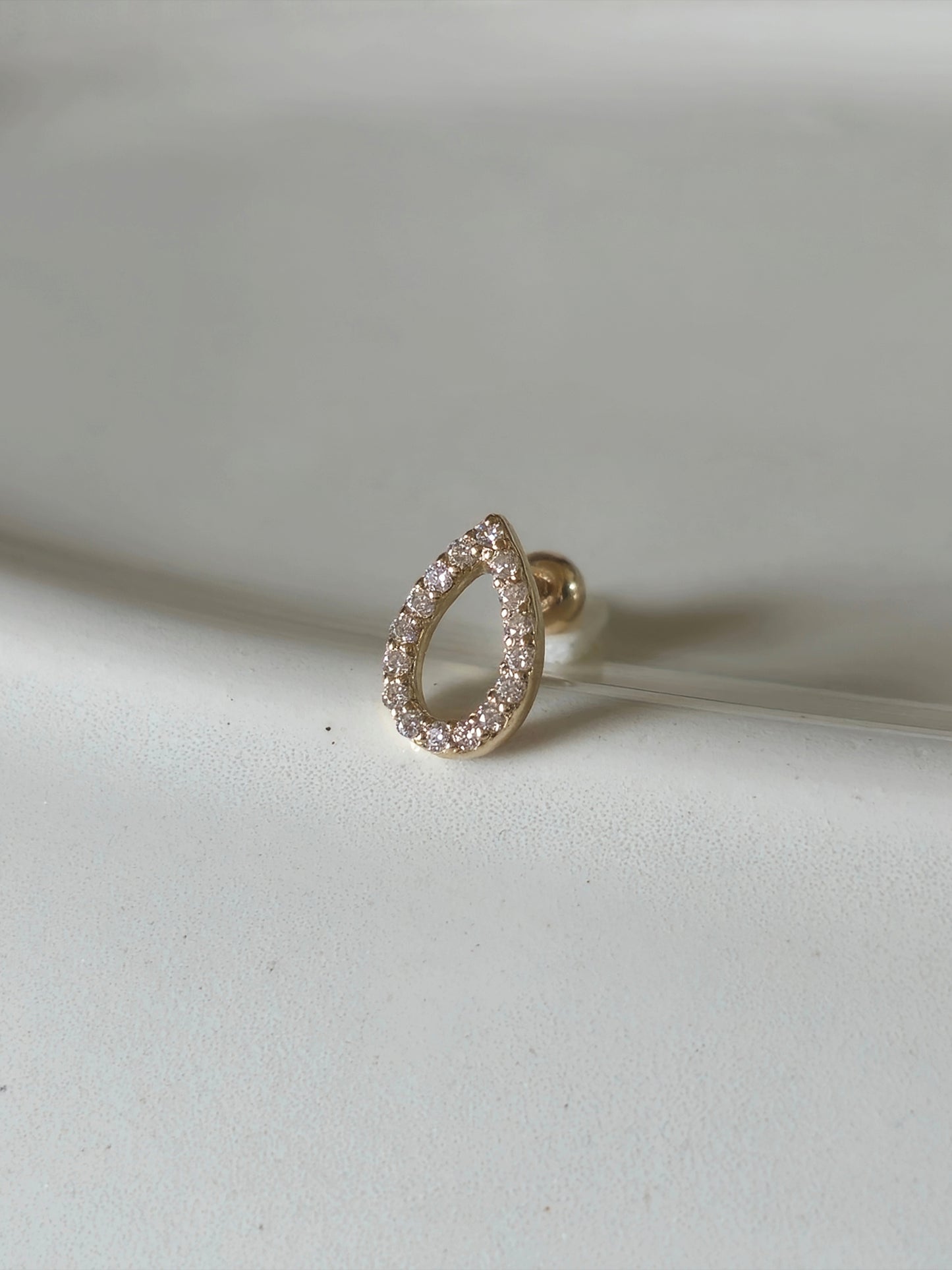 14k solid gold Teardrop Pave Stud piercing. Minimal Gold Drop Stud, Moissanite, Lab diamond.