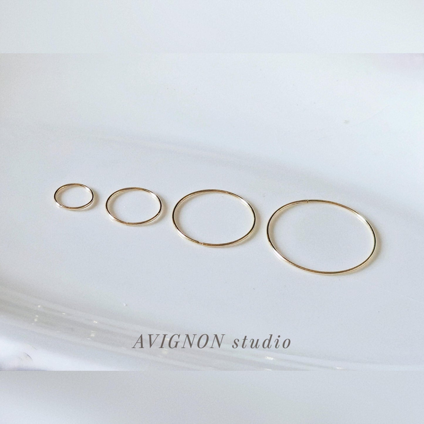 slim thin 14k solid gold hoop. wire hoop earring.10mm 14mm 21mm 27mm