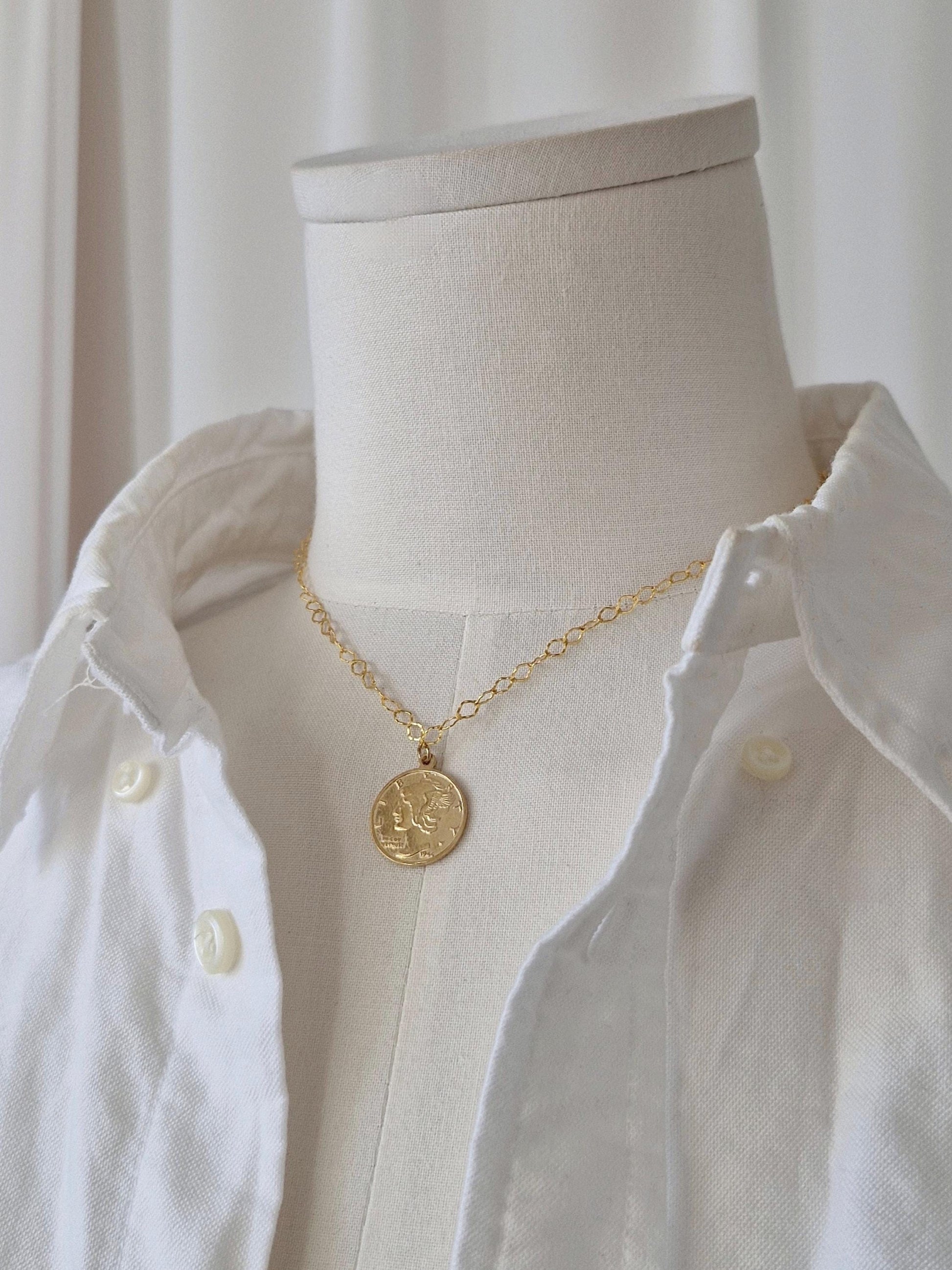 sterling silver coin pendant necklace. coin pendant necklace.